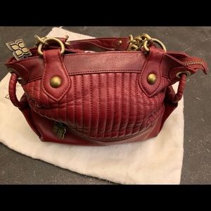 Red bag used discoloration on bottom & handles